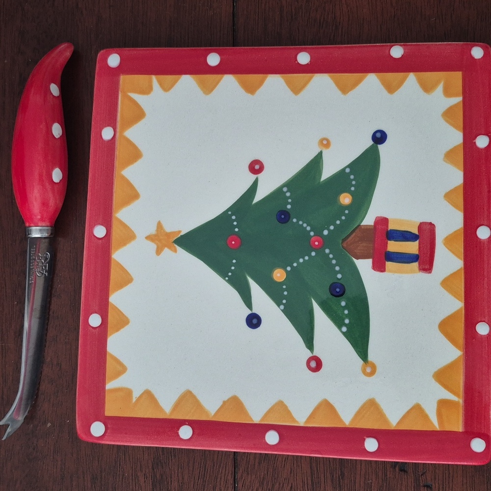 Ceramic Christmas plate and knife spreader, hand painted.  Measures 8 x 8 inches